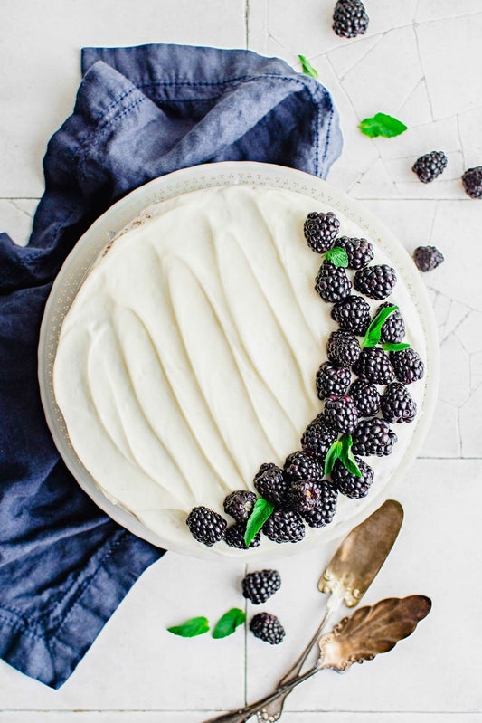 A homemade Blackberry Cake with Cream Cheese Frosting that takes under an hour to make? Yes, please! This quick masterpiece is rich with sweet blackberry flavor and the cream cheese will most certainly have you licking the spoon