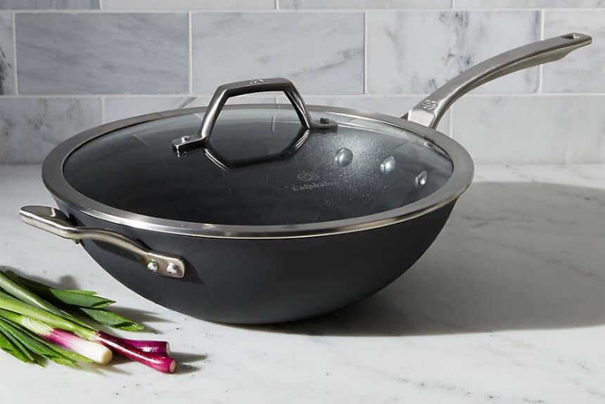 A wok is a solid cooking vessel that looks like a frying pan